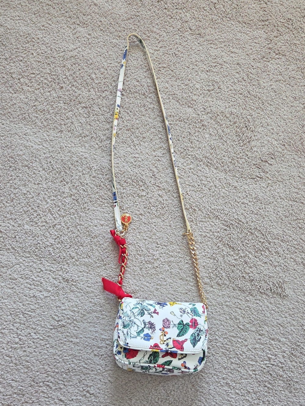 Juicy Couture White Floral Crossbody with Red Strap Accent